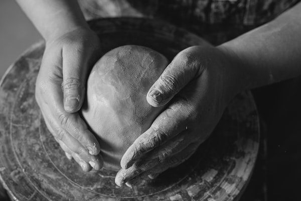 Clay being shaped on a pottery wheel